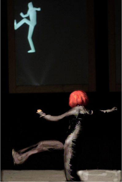 The actress dressed in the motion capture suit and her avatar.