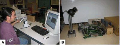 Physical setup of the application : A) user workspace with the haptic arm and graphical display; B) real workspace with the camera and the probe.